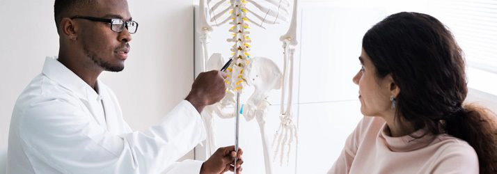 Chiropractic Richardson TX Doc Explaining Spine